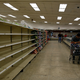 Supermarket shelves lay empty as the government curbed imports.